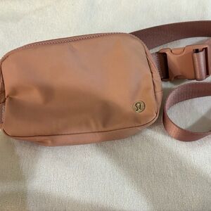 Pink pastel Lululemon belt bag